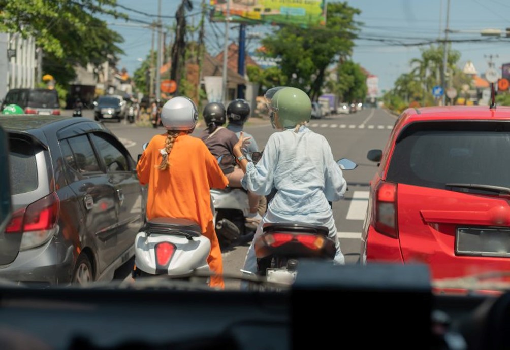 Group of friends riding motorcycles on Houston road