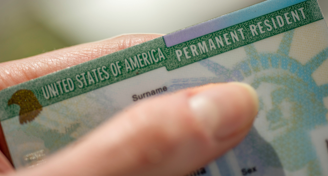 Close up view of permanent resident card
